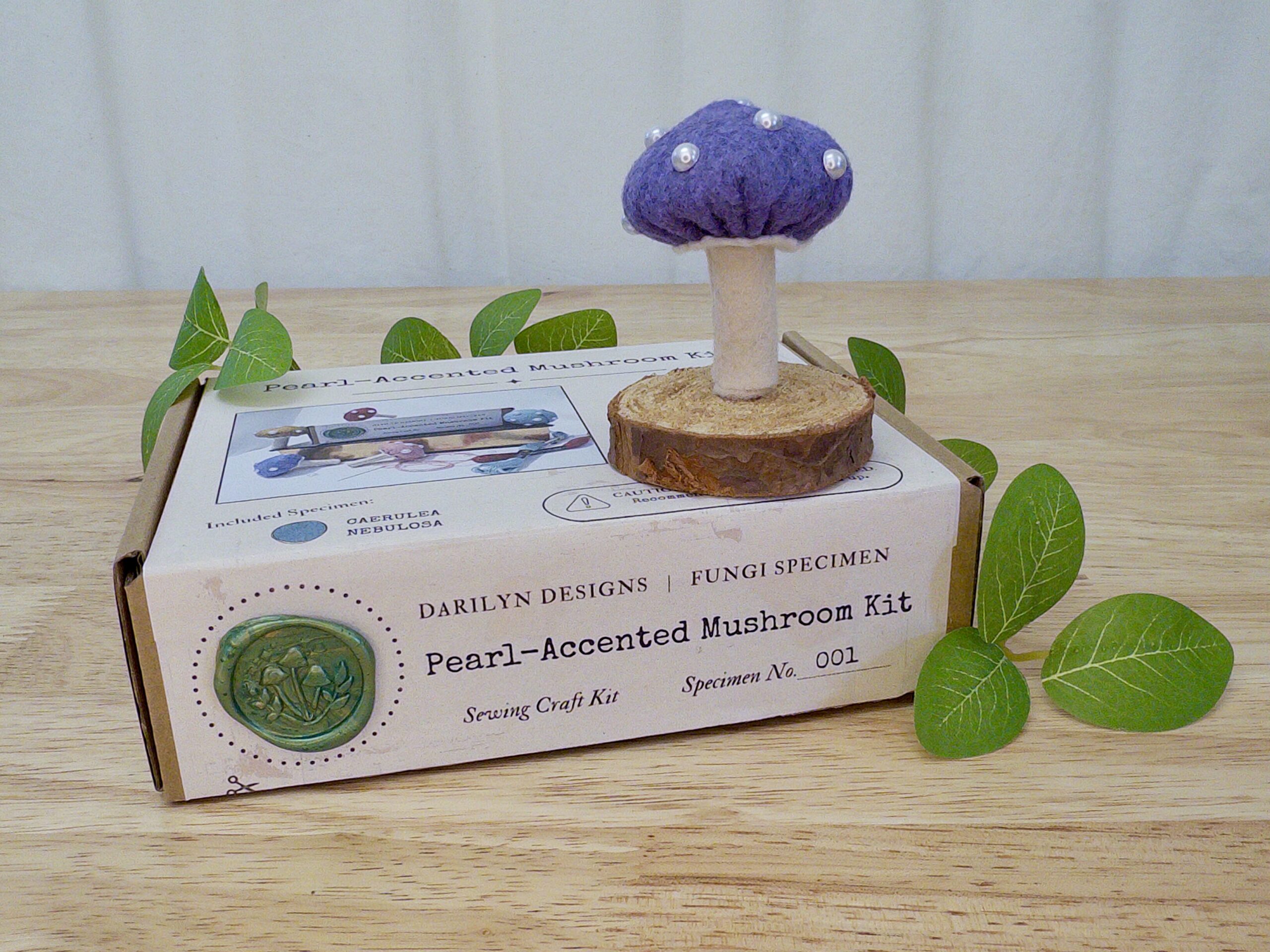 Finished pearl-accented felt mushroom
