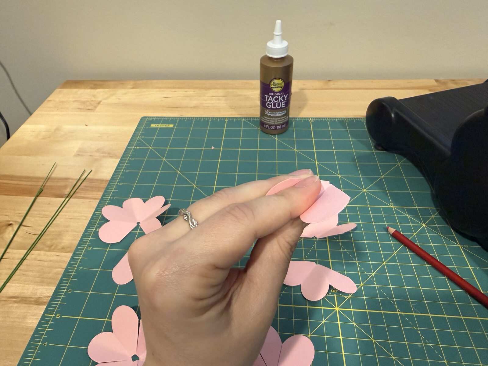 petals being cupped before getting glued.